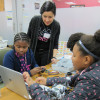 Daniela Ushizima helps out at a Black Girls Code hackathon in Oakland