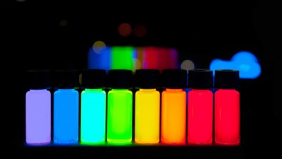 Quantum dots (shown here dissolved in liquid under ultraviolet light) offer tant