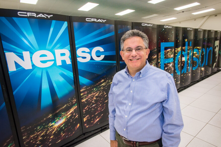 Jeff Broughton stands by the Edison supercomputer that he helped bring to NERSC, one of his proudest accomplishments during a long career.