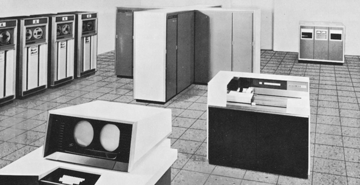 Historic photo showing a CDC6600 mainframe supercomputer.