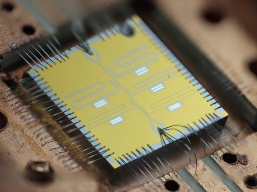 Close-up photo of qbit quantum computing hardware.