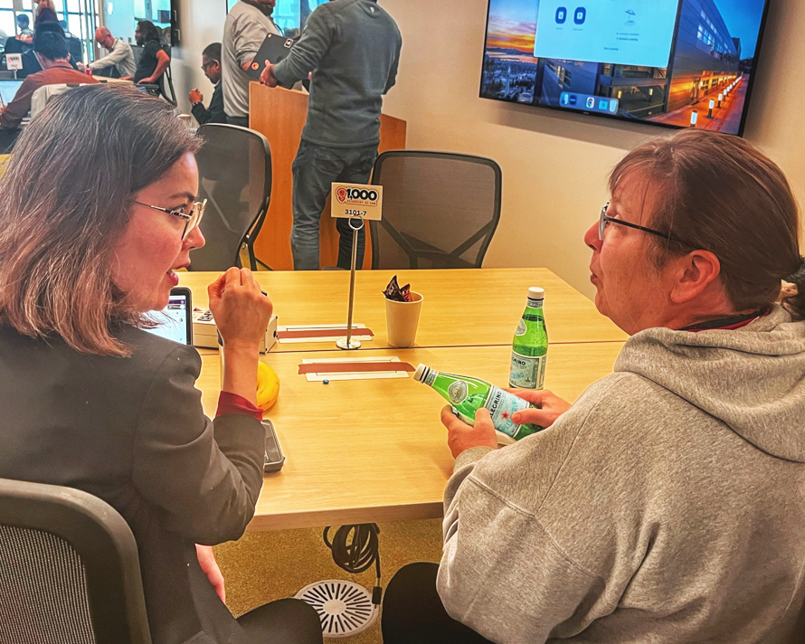 Dani Ushizima and Ann Almgren discuss possibilities at the beginning of the AI Jam event.