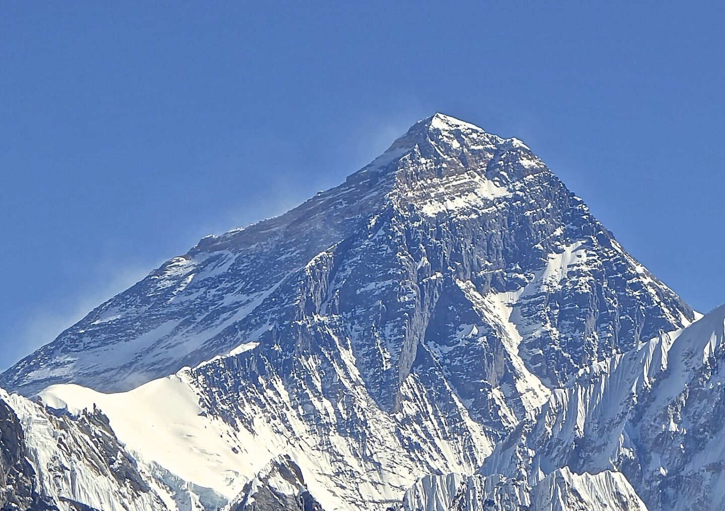 A view of Mount Everest, the world's highest peak, covered in snow and ice.