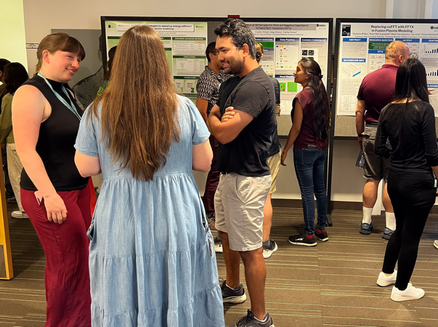 Summer students attend the 2024 poster session