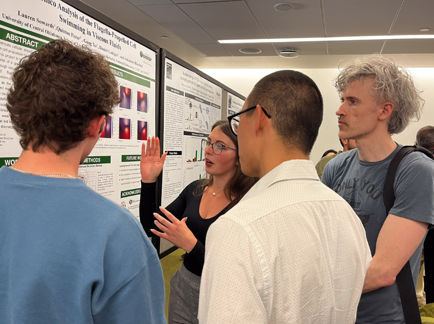 Summer students engage with CS staff during the 2024 Poster Session