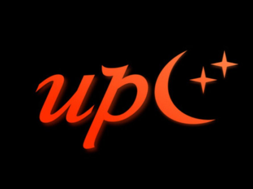 The image shows the text "upc" in a stylized red font, with the letter "c" shaped like a crescent moon and accompanied by two star symbols, all on a black background.