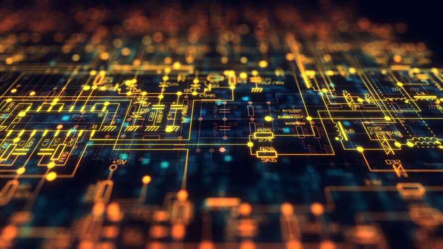 A close-up, stylized image of a glowing electronic circuit diagram, with bright yellow and orange lines and symbols representing interconnected components on a dark background, evoking the complexity and energy of advanced microchip or processor design.